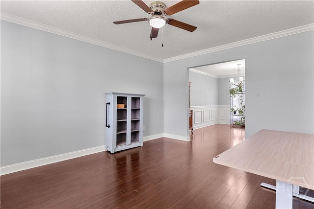 42 Kinlock Ct, Midway, GA 31320 - empty room featuring wood finished floors, a textured ceiling, crown molding, ceiling fan, and a wainscoted wall