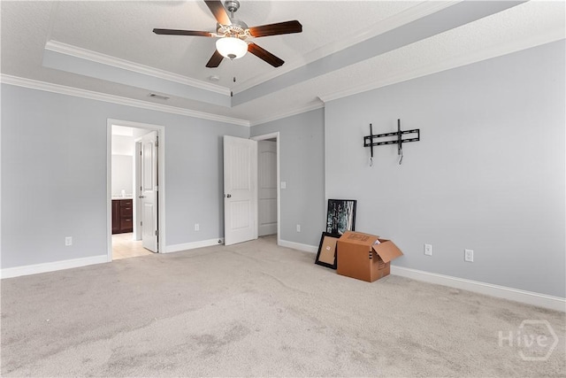 42 Kinlock Ct, Midway, GA 31320 - unfurnished bedroom with a raised ceiling, crown molding, light colored carpet, and baseboards