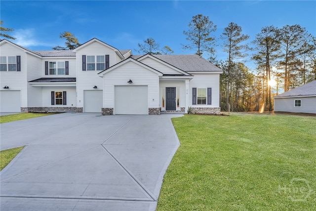 238 Haisley Run, Guyton, GA 31312 - view of front of property featuring concrete driveway, a front lawn, roof with shingles, and an attached garage