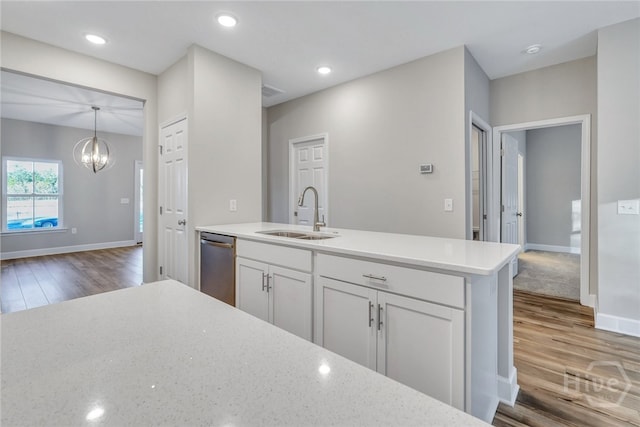 238 Haisley Run, Guyton, GA 31312 - kitchen featuring a sink, dishwasher, wood finished floors, a chandelier, and recessed lighting