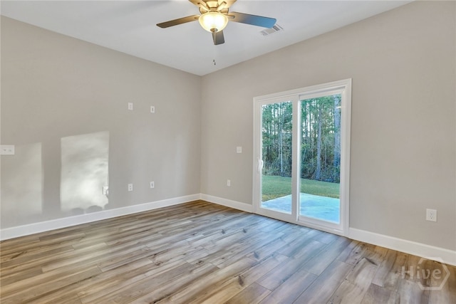 238 Haisley Run, Guyton, GA 31312 - empty room featuring a ceiling fan, wood finished floors, and baseboards