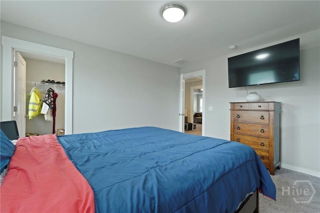 266 Cattle Run Way, Pooler, GA 31322 - carpeted bedroom featuring baseboards and a walk in closet