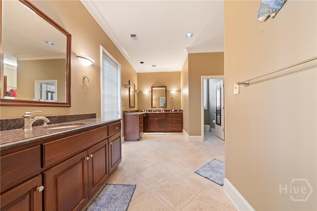 745 S Chickasaw Trl, Sparta, GA 31087 - full bathroom featuring ornamental molding, two vanities, baseboards, and tile patterned floors
