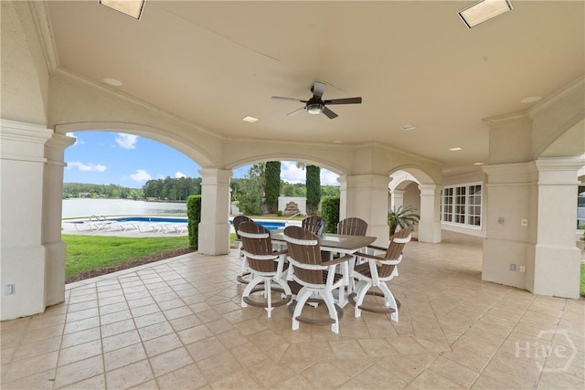 745 S Chickasaw Trl, Sparta, GA 31087 - view of patio / terrace with ceiling fan, outdoor dining space, and a water view