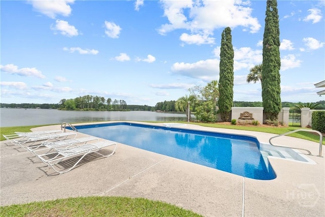 745 S Chickasaw Trl, Sparta, GA 31087 - outdoor pool featuring a patio area and a water view