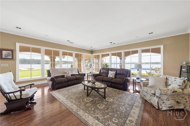 745 S Chickasaw Trl, Sparta, GA 31087 - living area featuring ornamental molding, wood finished floors, and a water view