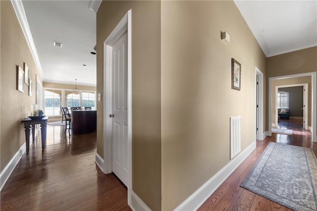 745 S Chickasaw Trl, Sparta, GA 31087 - hall with dark wood-type flooring, baseboards, and crown molding