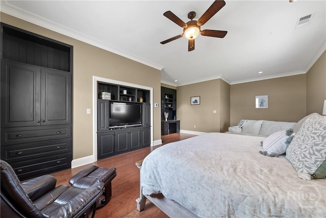745 S Chickasaw Trl, Sparta, GA 31087 - bedroom featuring wood finished floors, crown molding, baseboards, and ceiling fan