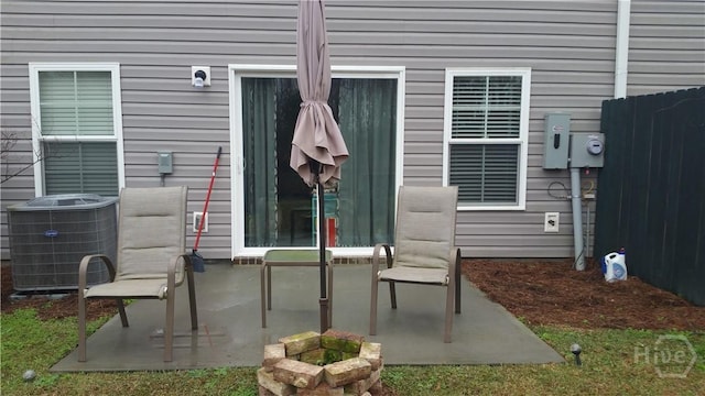 60 Kepler Loop, Richmond Hill, GA 31324 - property entrance with central AC and a patio