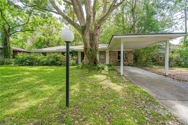 119 Dyches Dr, Savannah, GA 31406 - view of grassy yard with driveway