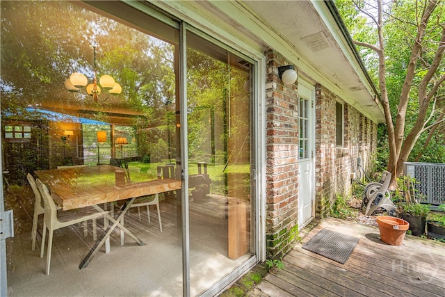 119 Dyches Dr, Savannah, GA 31406 - sunroom / solarium featuring a chandelier