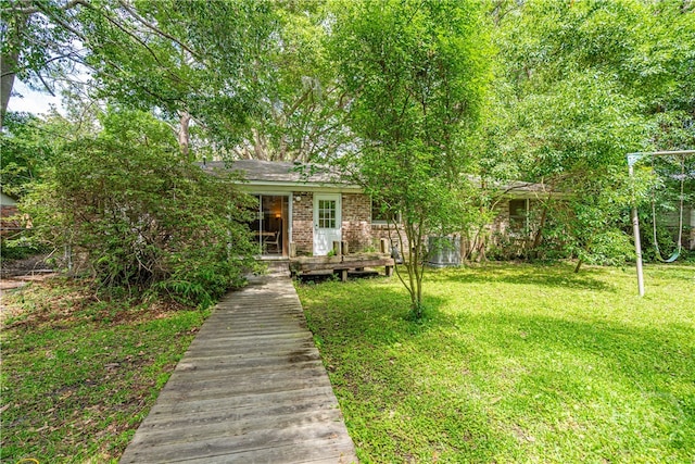 119 Dyches Dr, Savannah, GA 31406 - view of front facade featuring a front lawn and brick siding