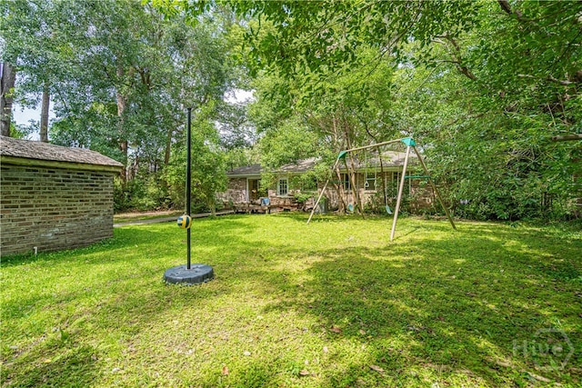 119 Dyches Dr, Savannah, GA 31406 - view of grassy yard with a playground