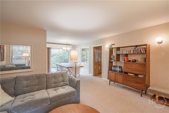 119 Dyches Dr, Savannah, GA 31406 - living area featuring a chandelier and light colored carpet