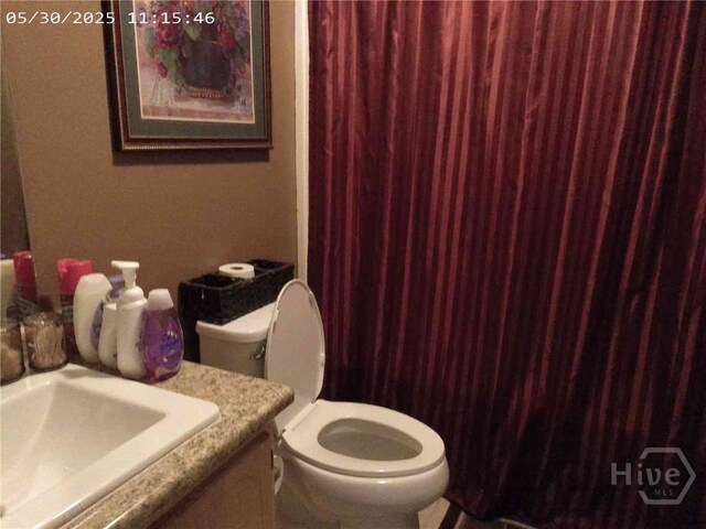 41 Crosby Dr, Hinesville, GA 31313 - bathroom featuring vanity and toilet