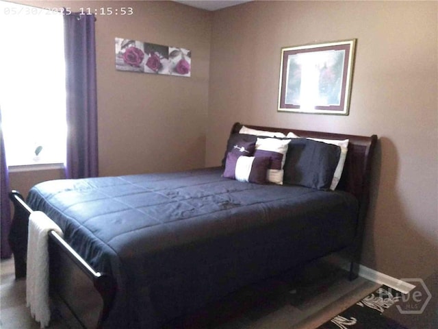 41 Crosby Dr, Hinesville, GA 31313 - bedroom featuring multiple windows