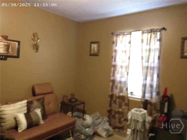 41 Crosby Dr, Hinesville, GA 31313 - living area with a textured ceiling