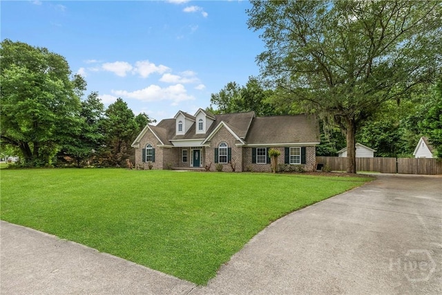 172 Jamestown Dr, Rincon, GA 31326 - view of front of home with brick siding and driveway