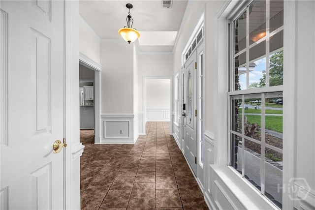 172 Jamestown Dr, Rincon, GA 31326 - hall featuring a decorative wall, ornamental molding, and wainscoting