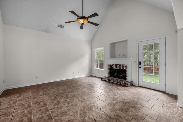 172 Jamestown Dr, Rincon, GA 31326 - unfurnished living room featuring high vaulted ceiling, ceiling fan, plenty of natural light, and baseboards