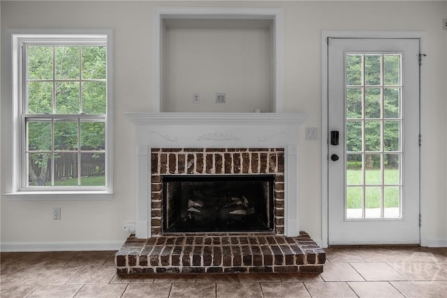 172 Jamestown Dr, Rincon, GA 31326 - detailed view of a fireplace and baseboards