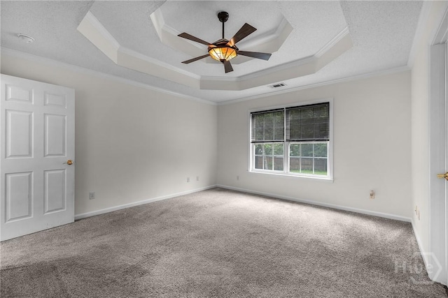 172 Jamestown Dr, Rincon, GA 31326 - carpeted spare room featuring ornamental molding, a tray ceiling, a ceiling fan, and baseboards