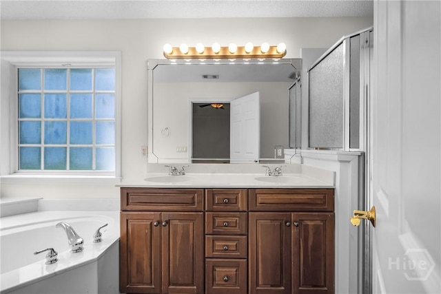 172 Jamestown Dr, Rincon, GA 31326 - full bath featuring double vanity, a garden tub, and a shower with shower door