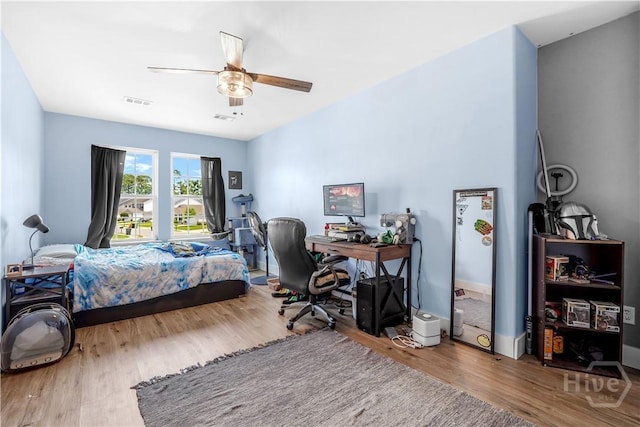 135 Verde Bnd, Savannah, GA 31419 - bedroom with wood finished floors, a desk, and a ceiling fan