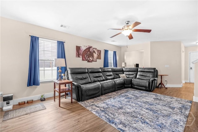 135 Verde Bnd, Savannah, GA 31419 - living area featuring ceiling fan, wood finished floors, and baseboards