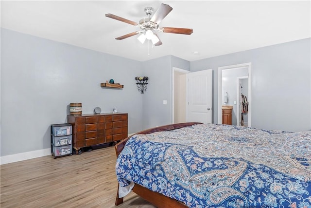 135 Verde Bnd, Savannah, GA 31419 - bedroom featuring wood finished floors, ceiling fan, baseboards, and ensuite bathroom