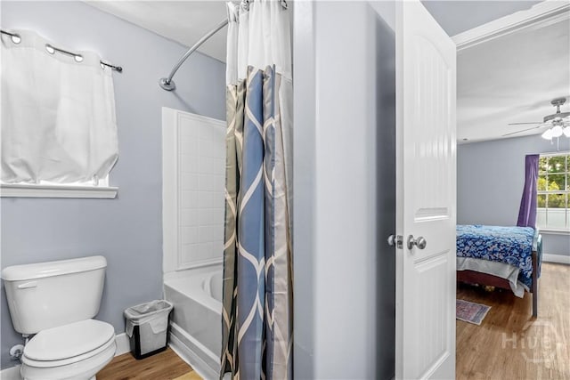 135 Verde Bnd, Savannah, GA 31419 - full bathroom with connected bathroom, wood finished floors, shower / bath combo with shower curtain, ceiling fan, and toilet