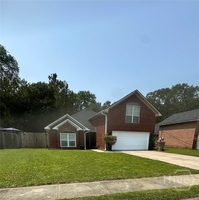 182 Gloucester Dr, Midway, GA 31320 - view of front of home featuring an attached garage, driveway, and brick siding