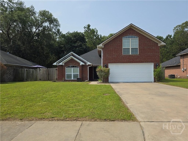 182 Gloucester Dr, Midway, GA 31320 - traditional home featuring a garage, central AC, concrete driveway, and brick siding
