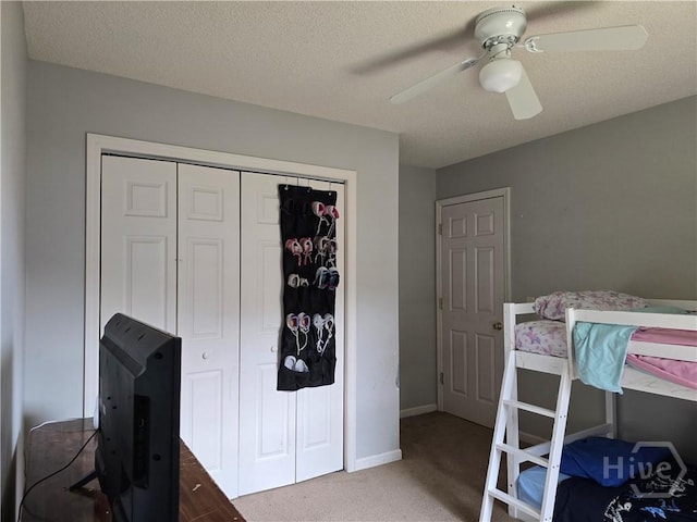 182 Gloucester Dr, Midway, GA 31320 - carpeted bedroom featuring a closet, a ceiling fan, and baseboards