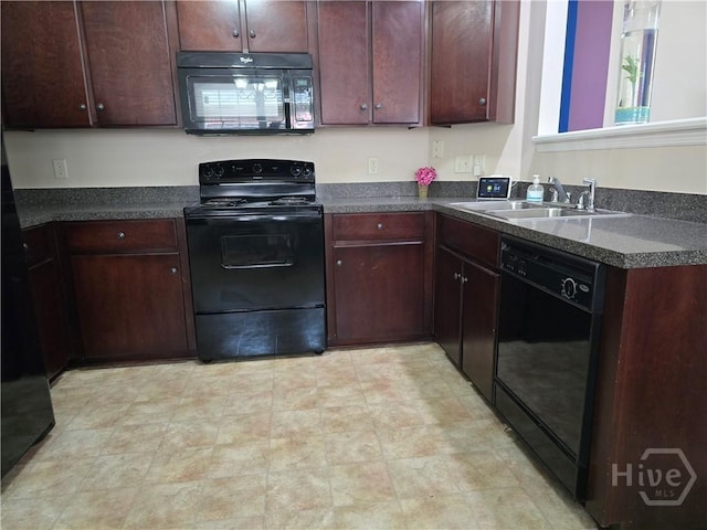 182 Gloucester Dr, Midway, GA 31320 - kitchen with black appliances, a sink, dark countertops, and light flooring