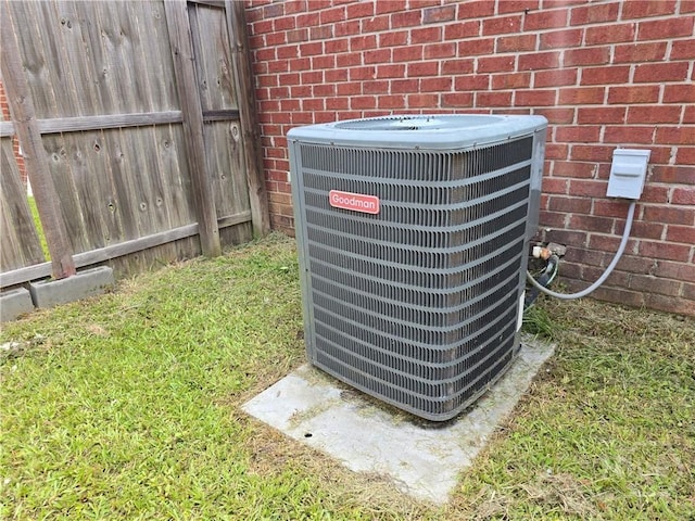 182 Gloucester Dr, Midway, GA 31320 - exterior view of central air condition unit and brick siding
