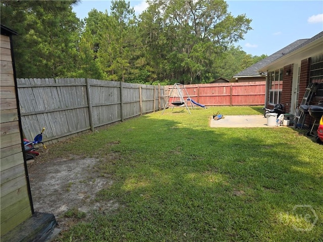 182 Gloucester Dr, Midway, GA 31320 - view of yard with a patio area
