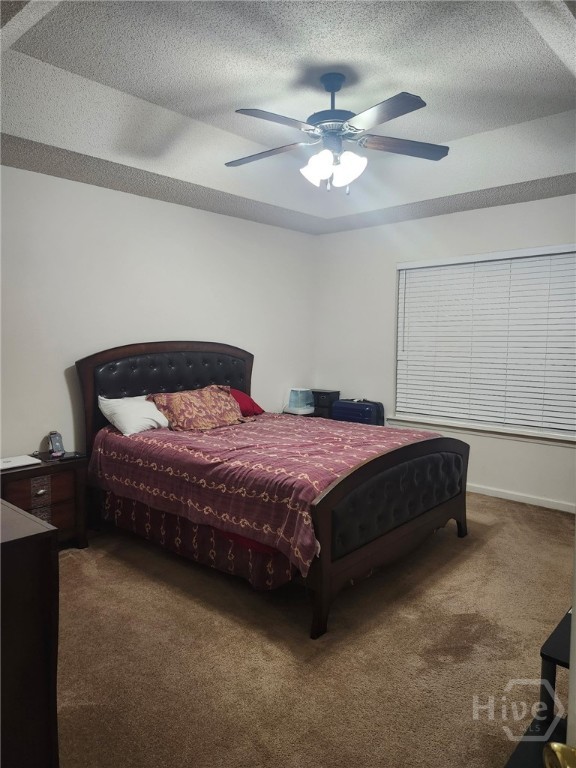 182 Gloucester Dr, Midway, GA 31320 - bedroom featuring carpet and ceiling fan