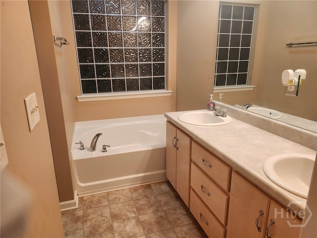 182 Gloucester Dr, Midway, GA 31320 - bathroom with a bath and double vanity