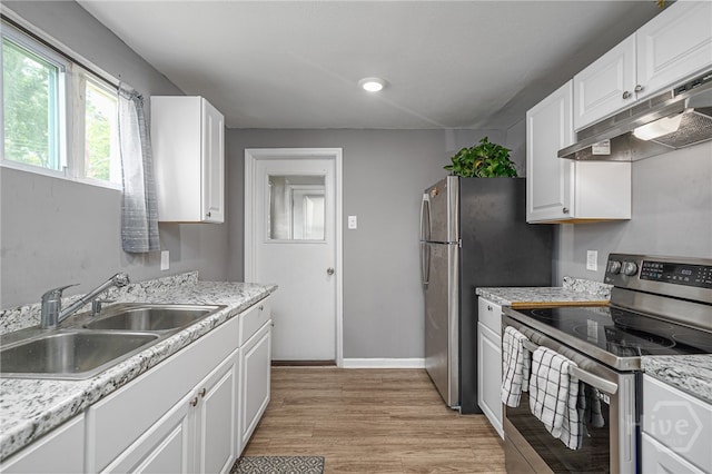 1515 Vine St, Savannah, GA 31401 - kitchen featuring stainless steel appliances, a sink, light countertops, white cabinetry, and recessed lighting