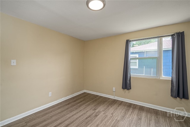 1515 Vine St, Savannah, GA 31401 - unfurnished room with wood finished floors and baseboards