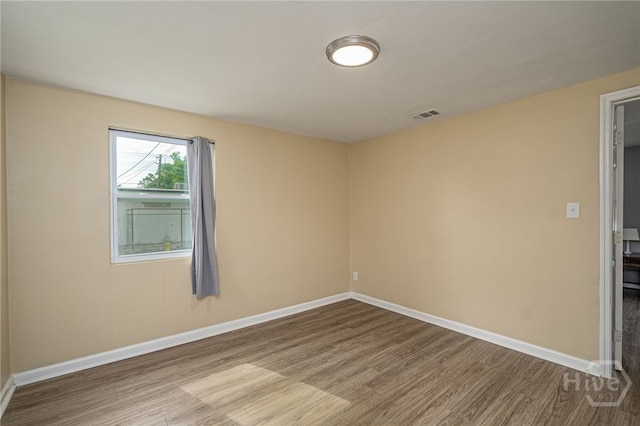 1515 Vine St, Savannah, GA 31401 - unfurnished room featuring wood finished floors and baseboards