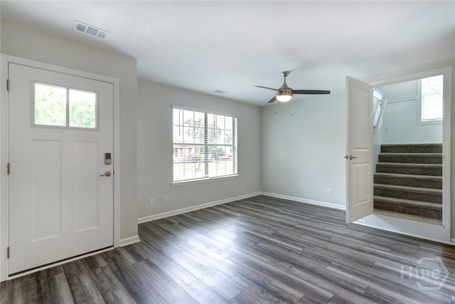 106 Oyster Catcher Ln, Savannah, GA 31410 - foyer with stairway, dark wood-style flooring, a ceiling fan, and baseboards