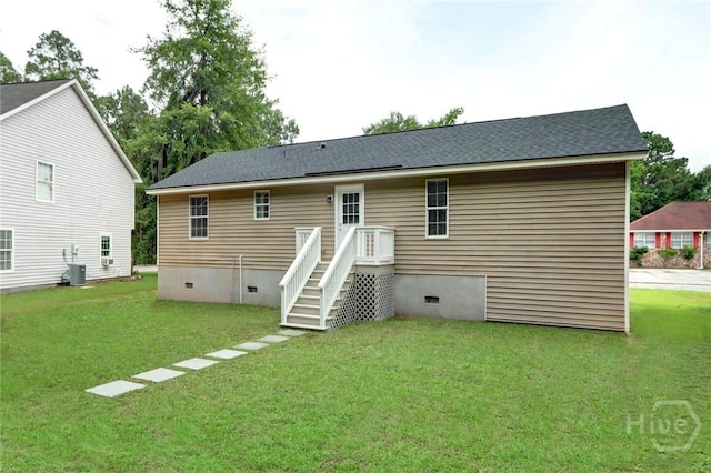 106 Oyster Catcher Ln, Savannah, GA 31410 - back of house with crawl space, a lawn, and central AC