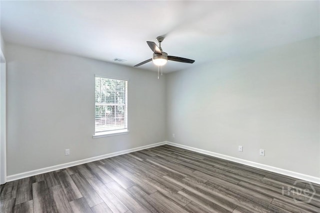 106 Oyster Catcher Ln, Savannah, GA 31410 - unfurnished room with dark wood-style flooring, ceiling fan, and baseboards