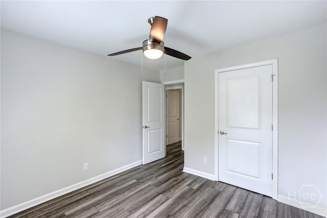 106 Oyster Catcher Ln, Savannah, GA 31410 - unfurnished bedroom featuring wood finished floors, baseboards, and a ceiling fan