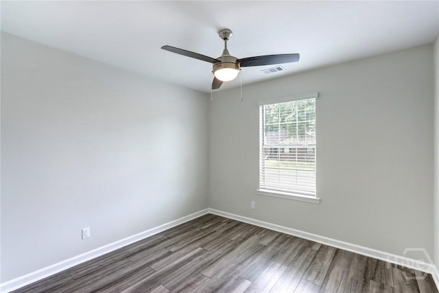 106 Oyster Catcher Ln, Savannah, GA 31410 - spare room featuring dark wood-type flooring, ceiling fan, and baseboards