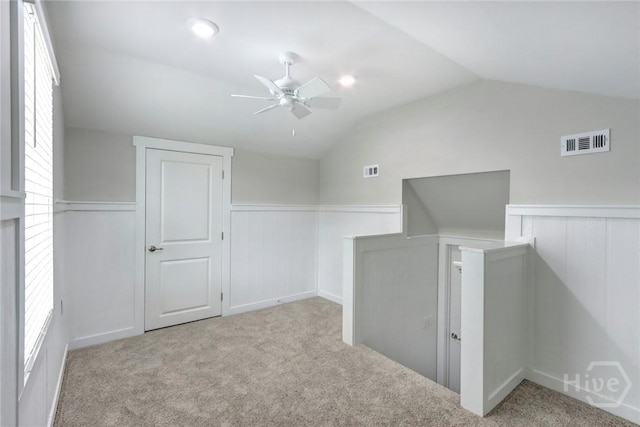 106 Oyster Catcher Ln, Savannah, GA 31410 - bonus room featuring lofted ceiling, ceiling fan, a wainscoted wall, carpet floors, and healthy amount of natural light