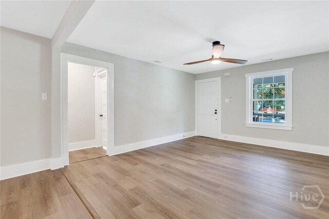 55 Saint Johns Ave, Savannah, GA 31404 - unfurnished room featuring wood finished floors, baseboards, and a ceiling fan