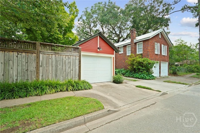 1301 E 48th St, Savannah, GA 31404 - garage featuring concrete driveway